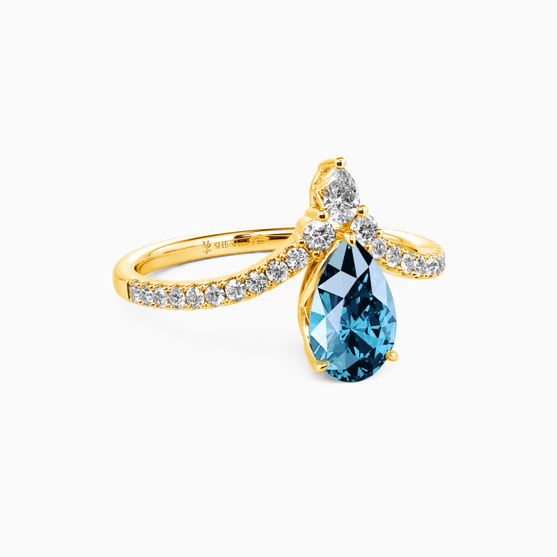 "A Drop Of Memories" Pear Cut Side Stone Engagement Ring