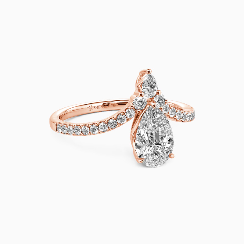 "A Drop Of Memories" Pear Cut Side Stone Engagement Ring