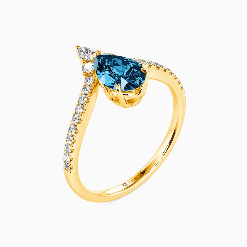"A Drop Of Memories" Pear Cut Side Stone Engagement Ring