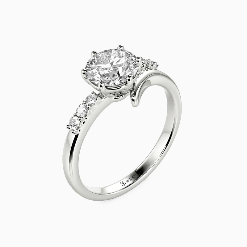 "Enchante Amour" Round Cut Side Stone Engagement Ring