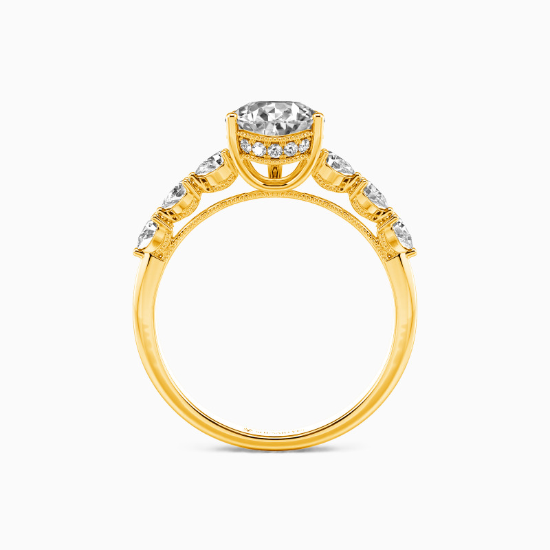 "A Tear-drop of Love" Pear Cut Side Stone Engagement Ring