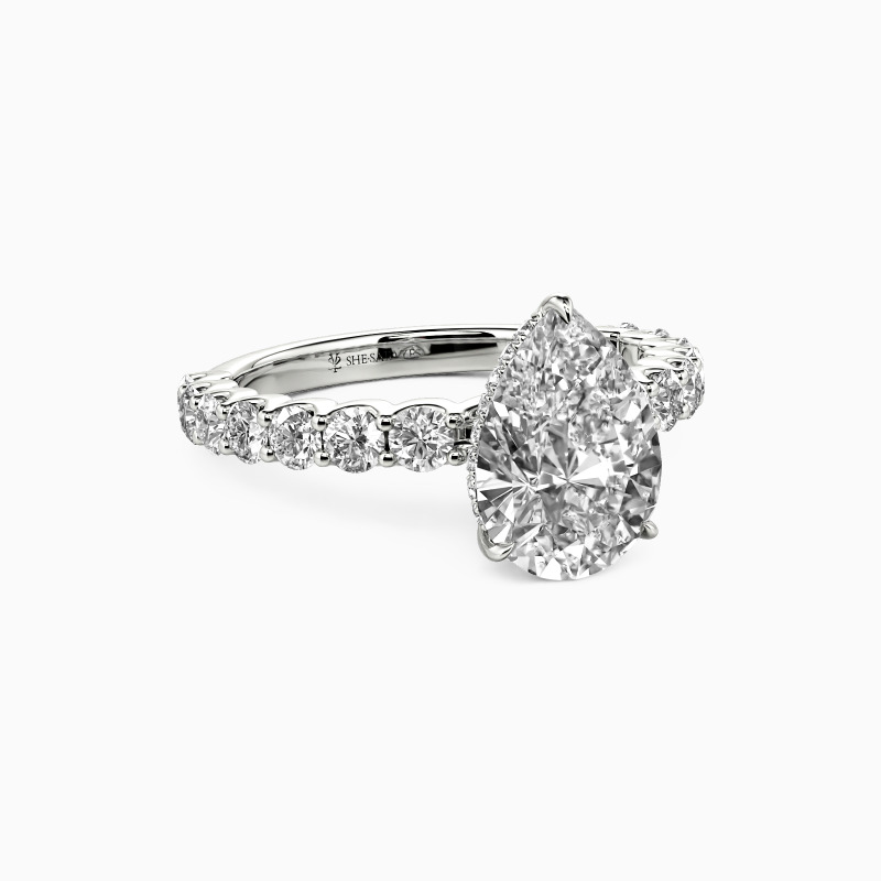 "There for You" Pear Cut Side Stone Engagement Ring