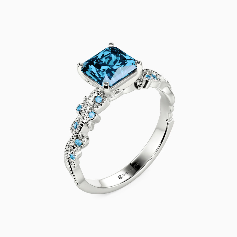 "Token of My Love" Radiant Cut Side Stone Engagement Ring