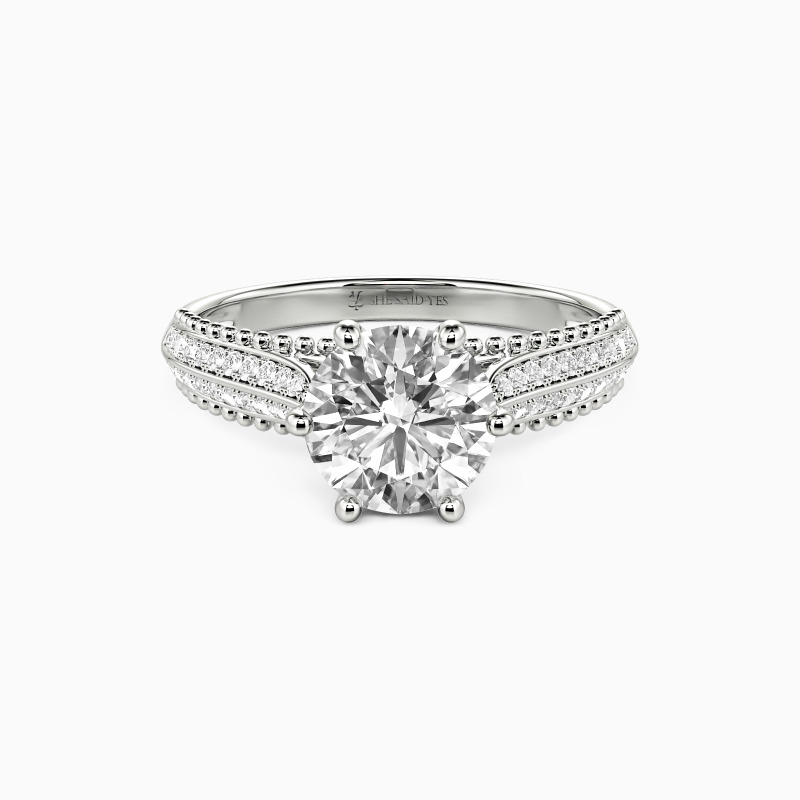 "Moving Forward Together" Round Cut Side Stone Engagement Ring