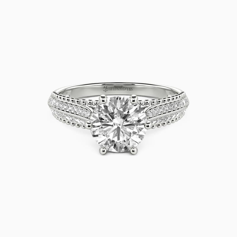 "Moving Forward Together" Round Cut Side Stone Engagement Ring