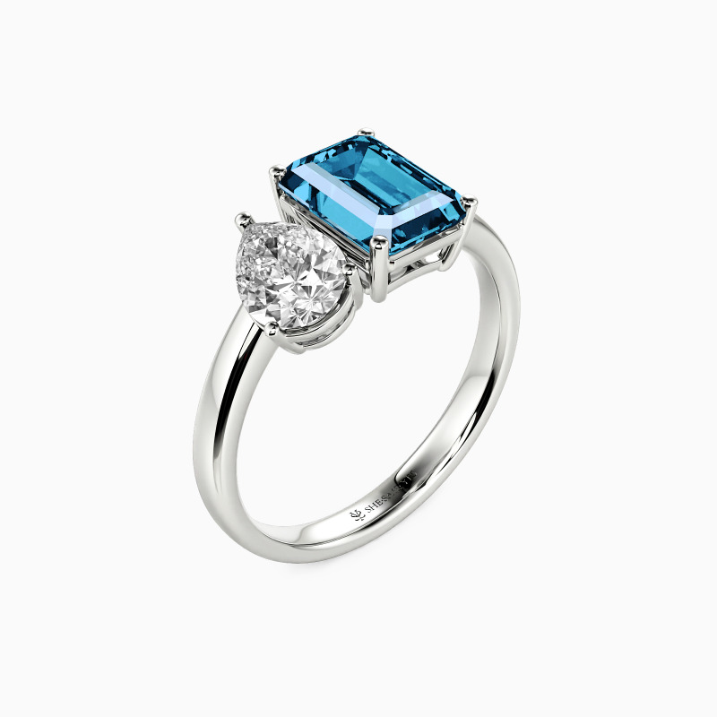 "An Ode to Affection" Emerald Cut Side Stone Engagement Ring