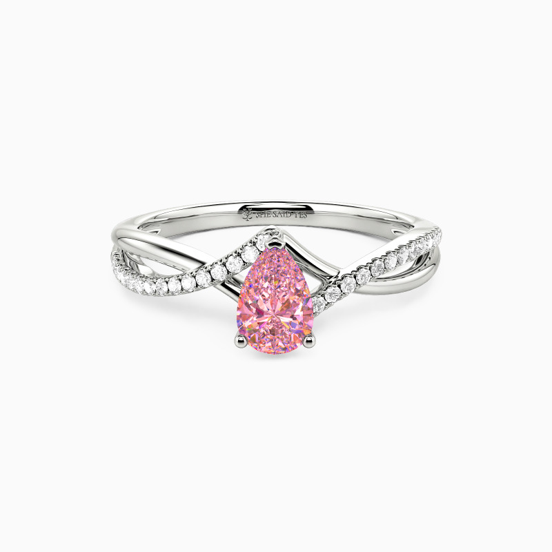 "Falling Slowly" 0.5ct Pear Cut Side Stone Engagement Ring
