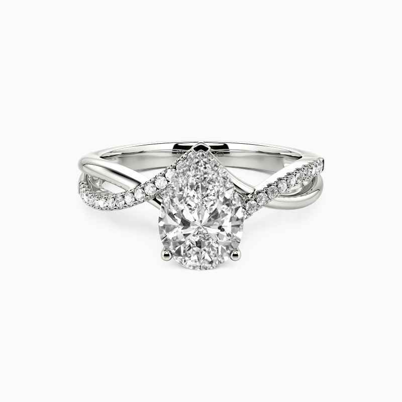 "Falling Slowly" 1.5ct Pear Cut Side Stone Engagement Ring