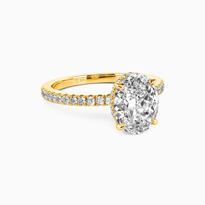 "The Love Note" Oval Cut Side Stone Engagement Ring