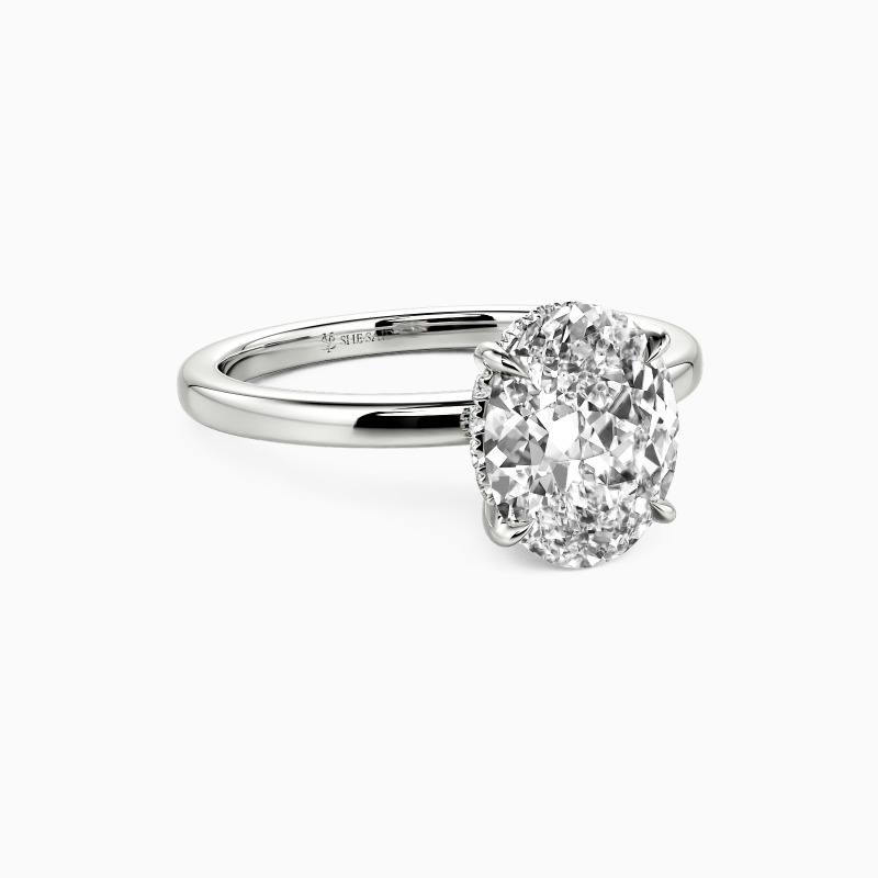 "A Statement of Faith" Oval Cut Side Stone Engagement Ring