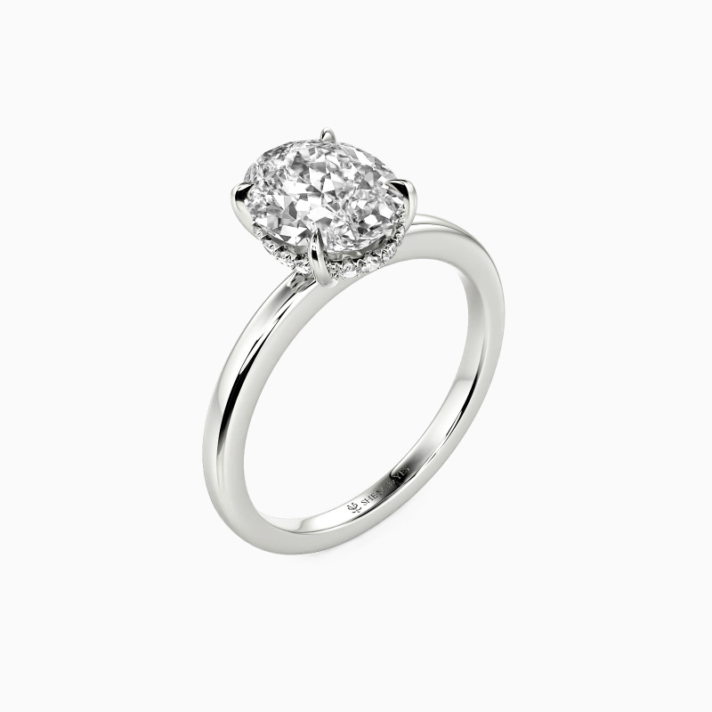 "A Statement of Faith" Oval Cut Side Stone Engagement Ring