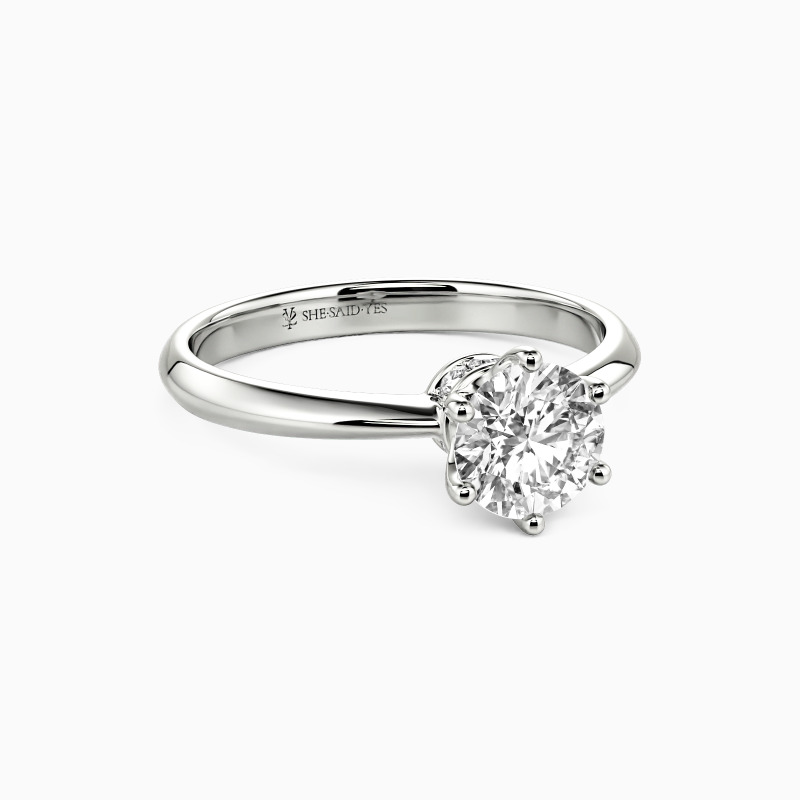 "Hand On Your Heart" Round Cut Side Stone Engagement Ring