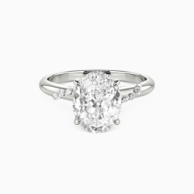 "Romantic Reverie" Oval Cut Side Stone Engagement Ring