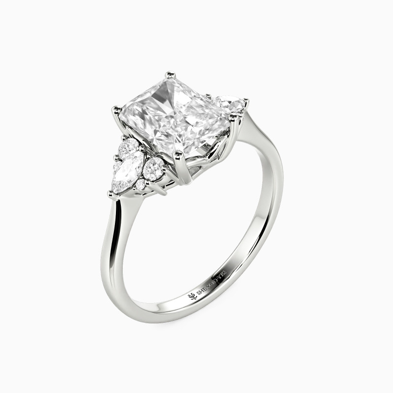 "Make You Feel My Love" Radiant Cut Side Stone Engagement Ring