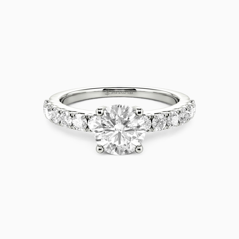 "Starlit Embrace" Round Cut Side Stone Engagement Ring