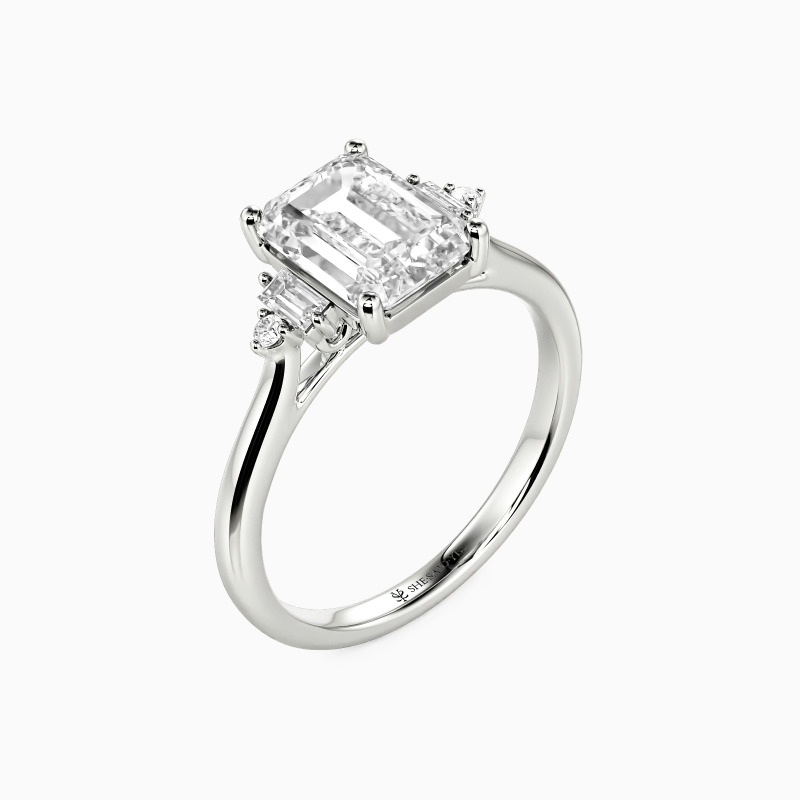 "Urban Luminescence" Emerald Cut Side Stone Engagement Ring