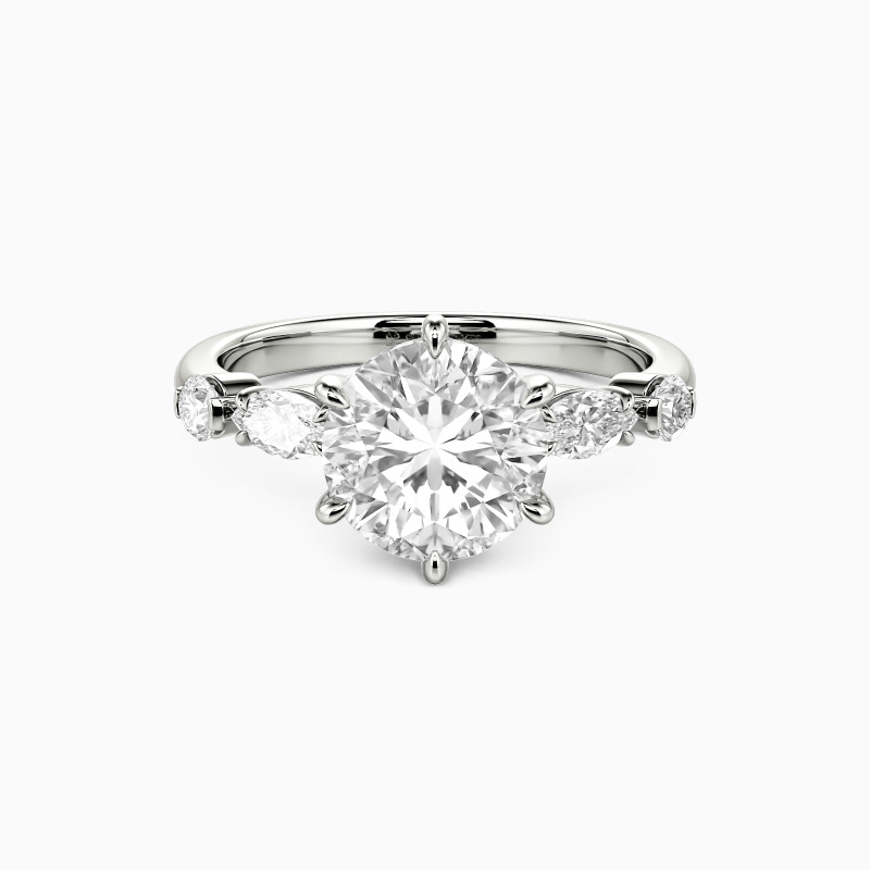 "The Rhythm of Us" Round Cut Side Stone Engagement Ring