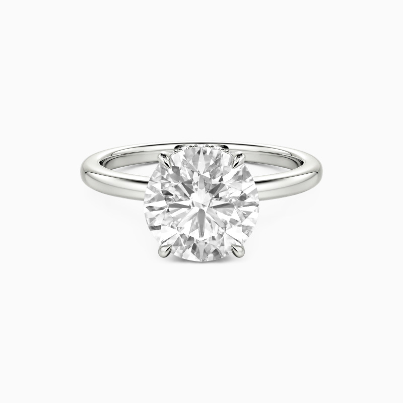 "Promise of Tomorrow" Round Cut Side Stone Engagement Ring
