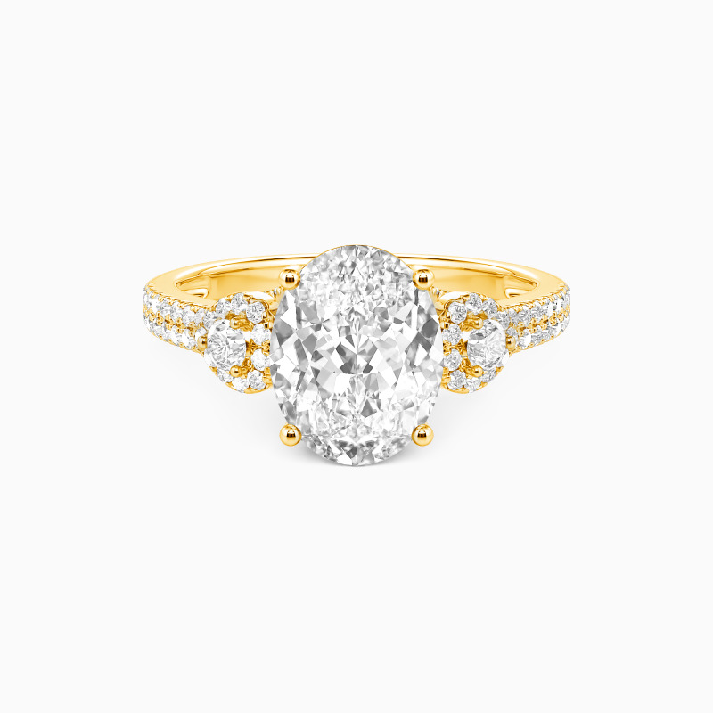 "A Moment Like This" Oval Cut Side Stone Engagement Ring