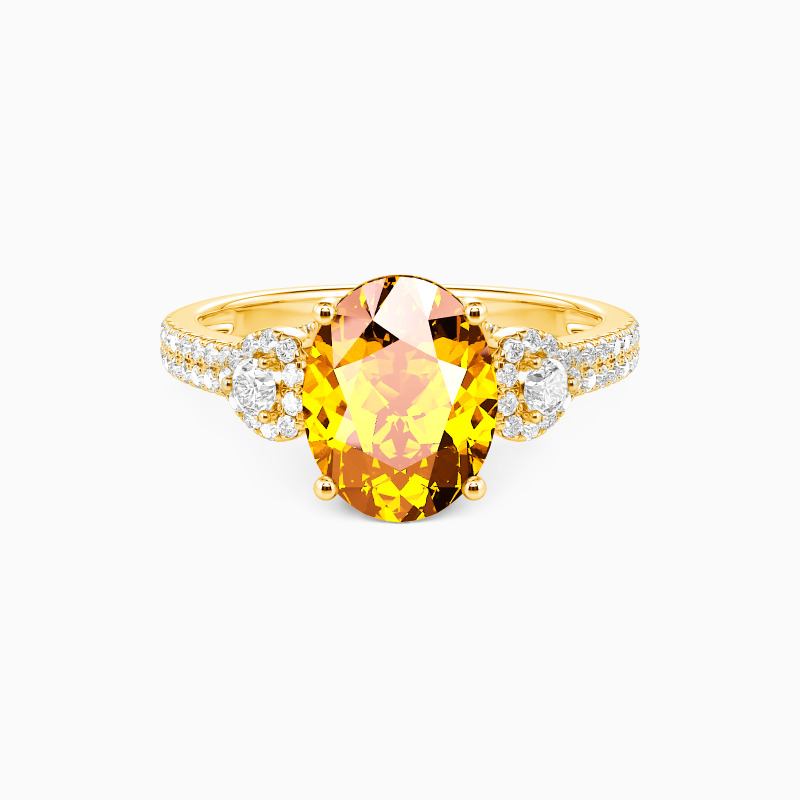 "A Moment Like This" Oval Cut Side Stone Engagement Ring