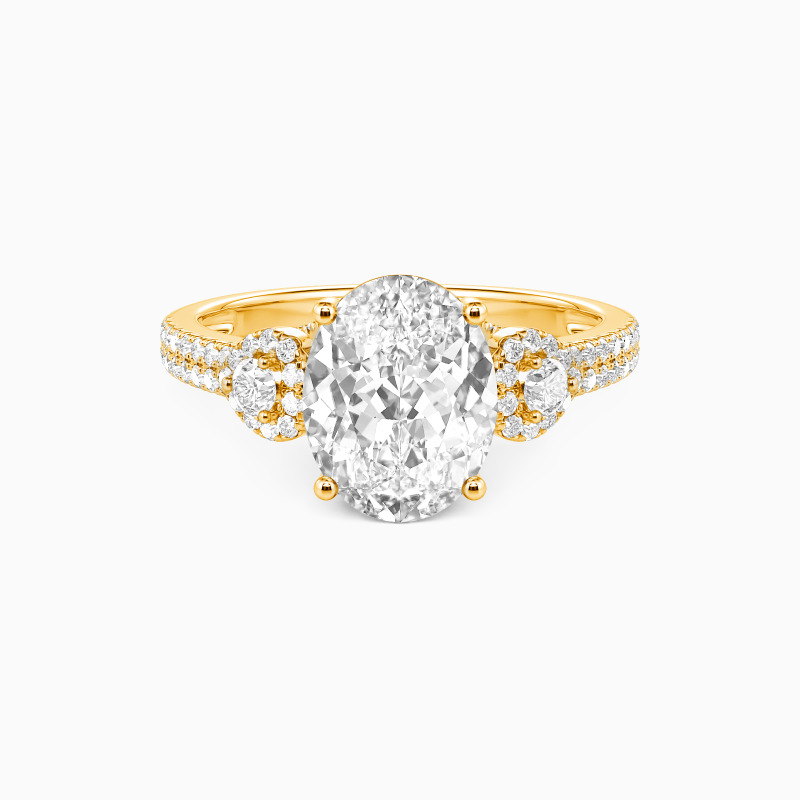 "A Moment Like This" Oval Cut Side Stone Engagement Ring