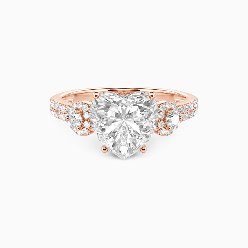 "Forever in Motion" Heart Cut Side Stone Engagement Ring