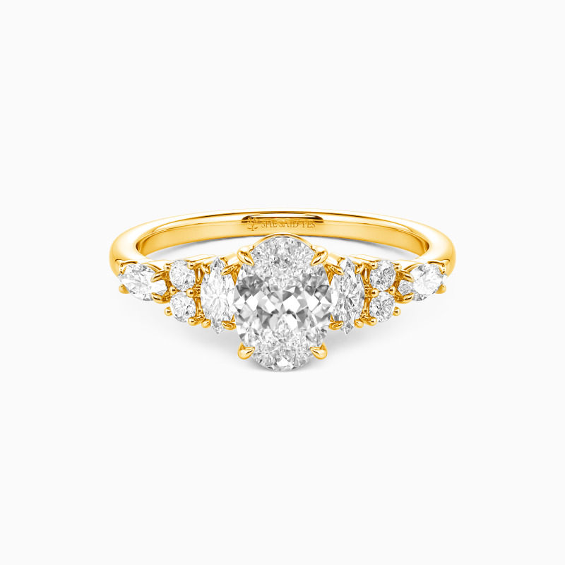 "The Beautiful Becoming" Oval Cut Cluster Side Stone Engagement Ring