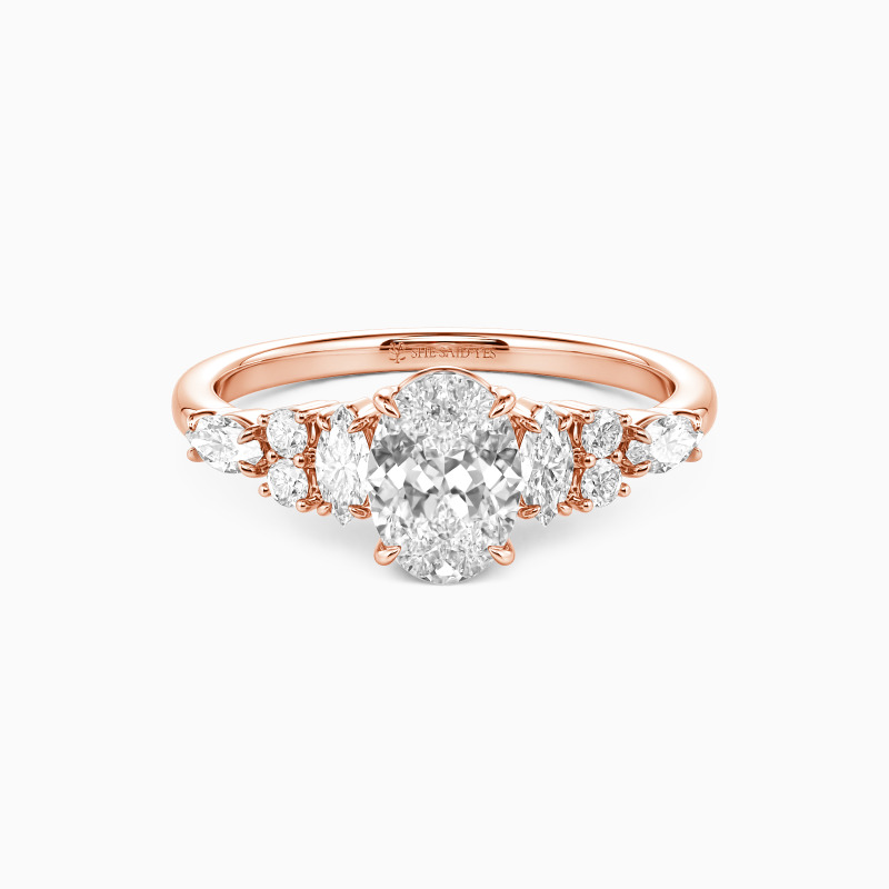 "The Beautiful Becoming" Oval Cut Cluster Side Stone Engagement Ring