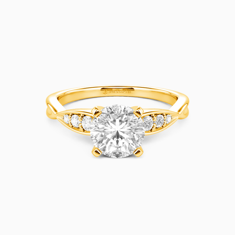 "Tenderness and Joy" Round Cut Side Stone Engagement Ring