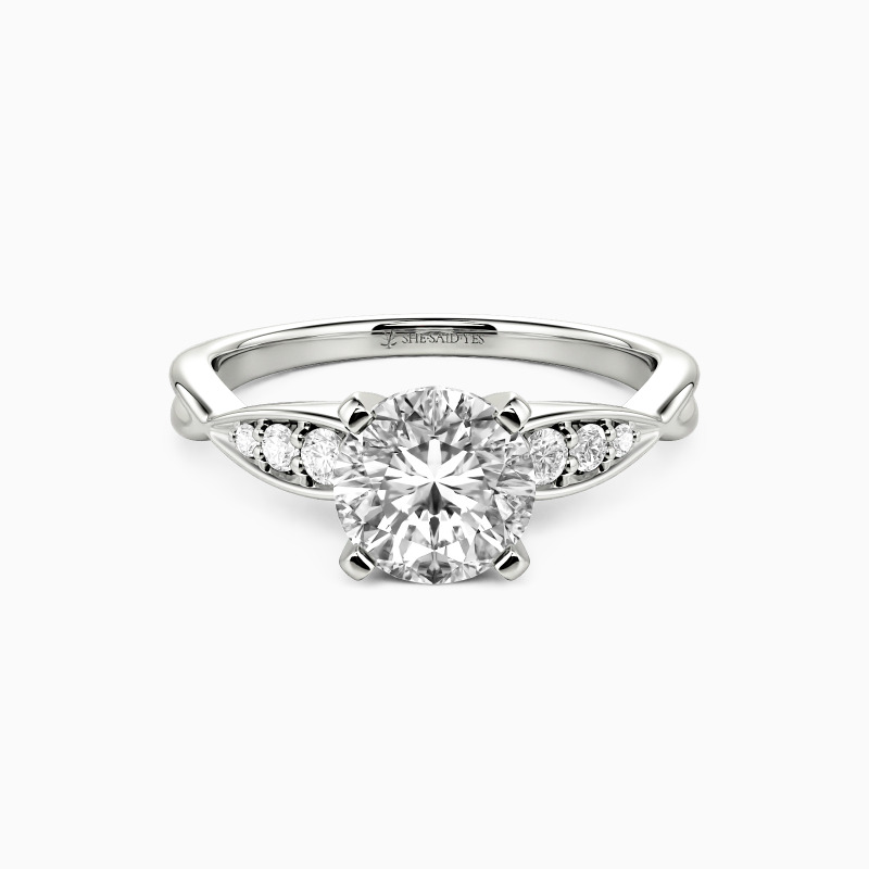 "Tenderness and Joy" Round Cut Side Stone Engagement Ring