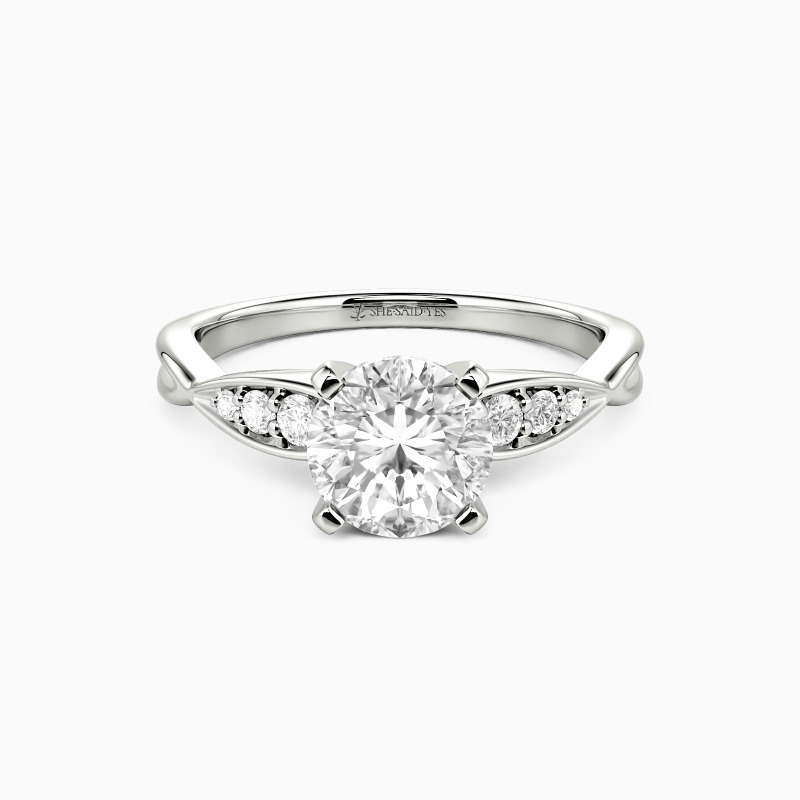 "Tenderness and Joy" Round Cut Side Stone Engagement Ring