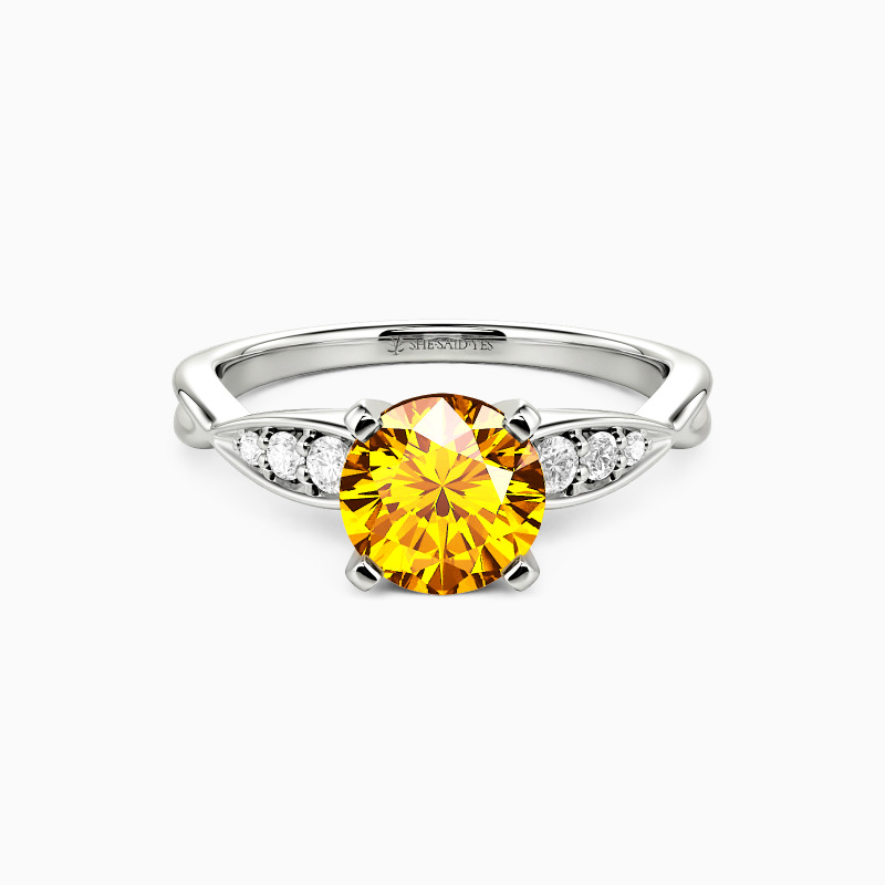 "Tenderness and Joy" Round Cut Side Stone Engagement Ring