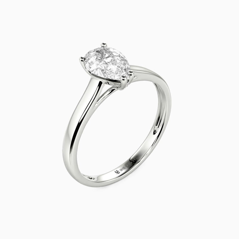 "Love Story" 0.5ct Pear Cut Solitaire Engagement Ring