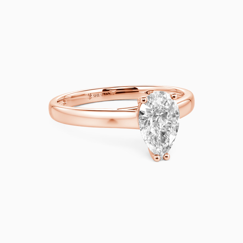 "Love Story" 0.8ct Pear Cut Solitaire Engagement Ring