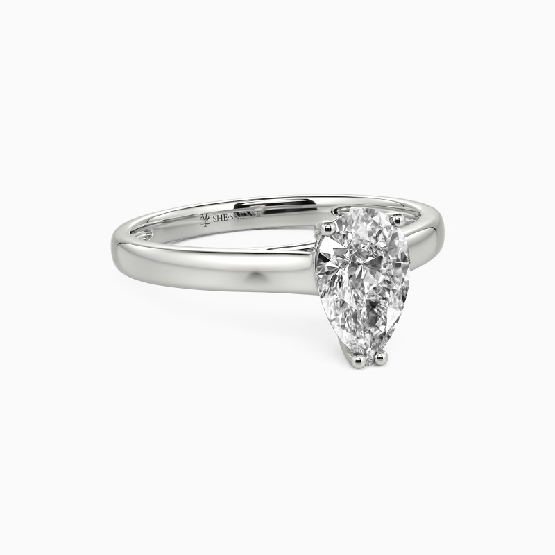 "Love Story" Pear Cut Solitaire Engagement Ring