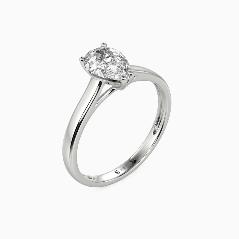 "Love Story" Pear Cut Solitaire Engagement Ring