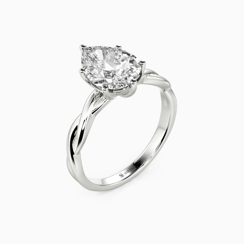 "Anything For Her" Pear Cut Solitaire Engagement Ring