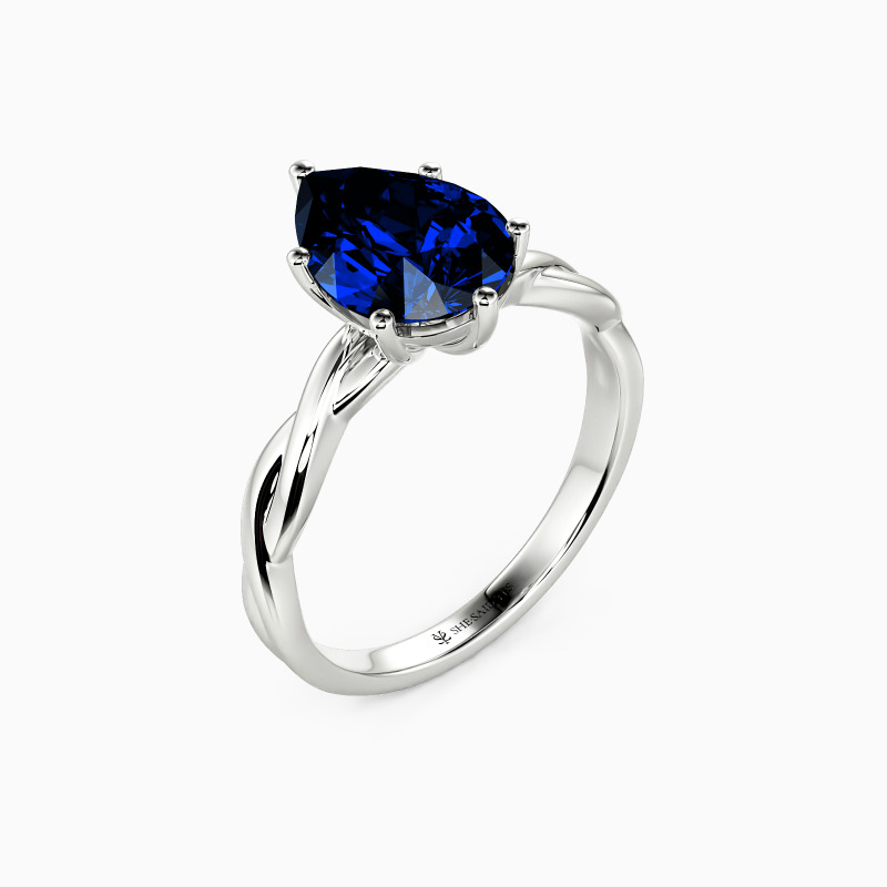 "Anything For Her" Pear Cut Solitaire Engagement Ring