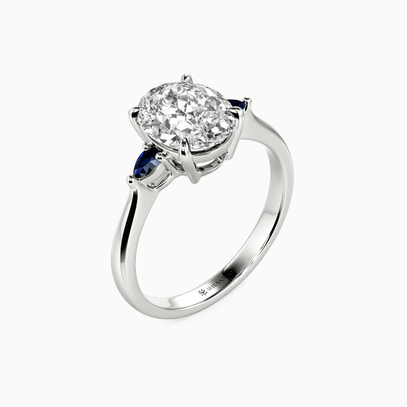 "The Beginning Of Love" Oval Cut Three Stone Engagement Ring