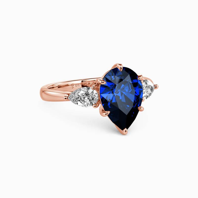 "Never-ending Story" Pear Cut Three Stone Engagement Ring