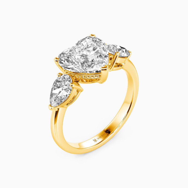 "The Love Melody" Heart Cut Three Stone Engagement Ring