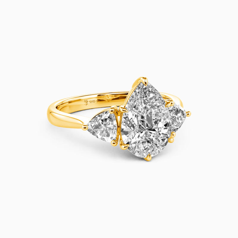 "Secret Of Your Smile" Pear Cut Three Stone Engagement Ring