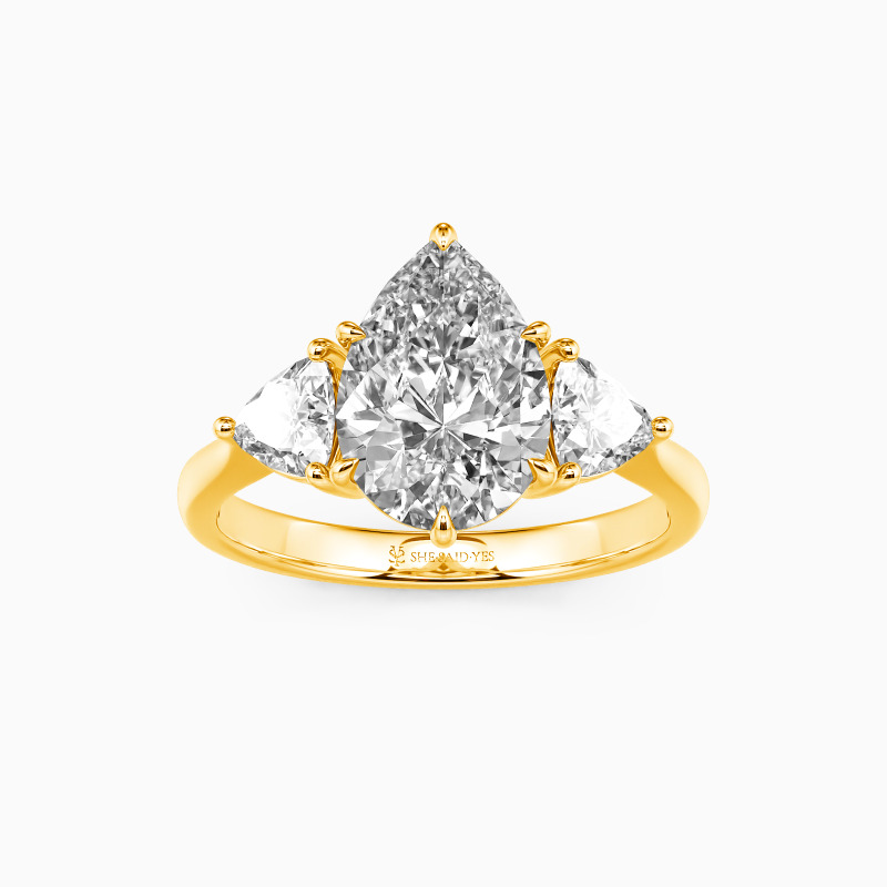 "Secret Of Your Smile" Pear Cut Three Stone Engagement Ring