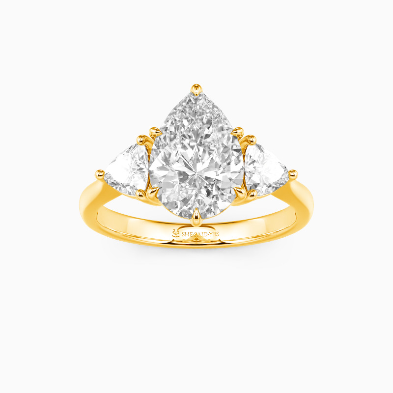 "Secret Of Your Smile" Pear Cut Three Stone Engagement Ring