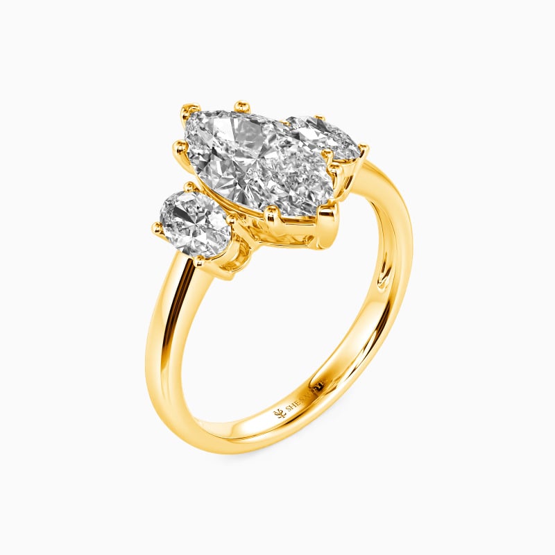 "For Your Love Only" Marquise Cut Three Stone Engagement Ring
