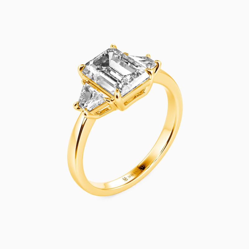 "This Is Where You Belong" Emerald Cut Three Stone Engagement Ring