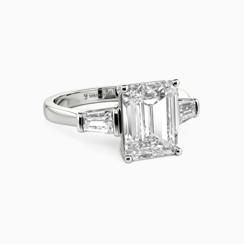 "Faithfully Yours" Emerald Cut Three Stone Engagement Ring