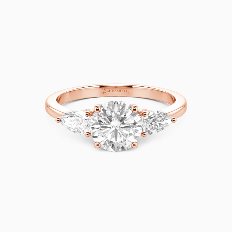 "The Beginning" Round Cut Three Stone Engagement Ring