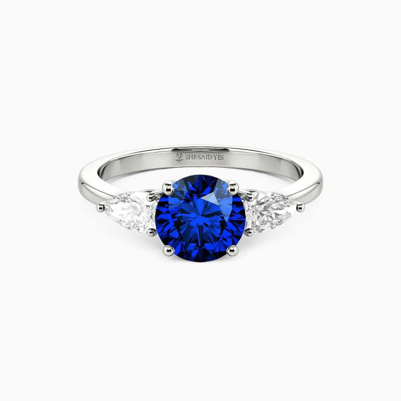 "The Beginning" Round Cut Three Stone Engagement Ring