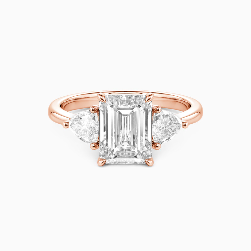 "Through the Ages" Emerald Cut Three Stone Engagement Ring